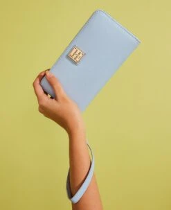 Saffiano Large Zip Around Wristlet Glacier Blue 26 Saffiano Large Zip Around Wristlet Glacier Blue -Dooney & Bourke W2SAF0126 ILD lifestyle 1